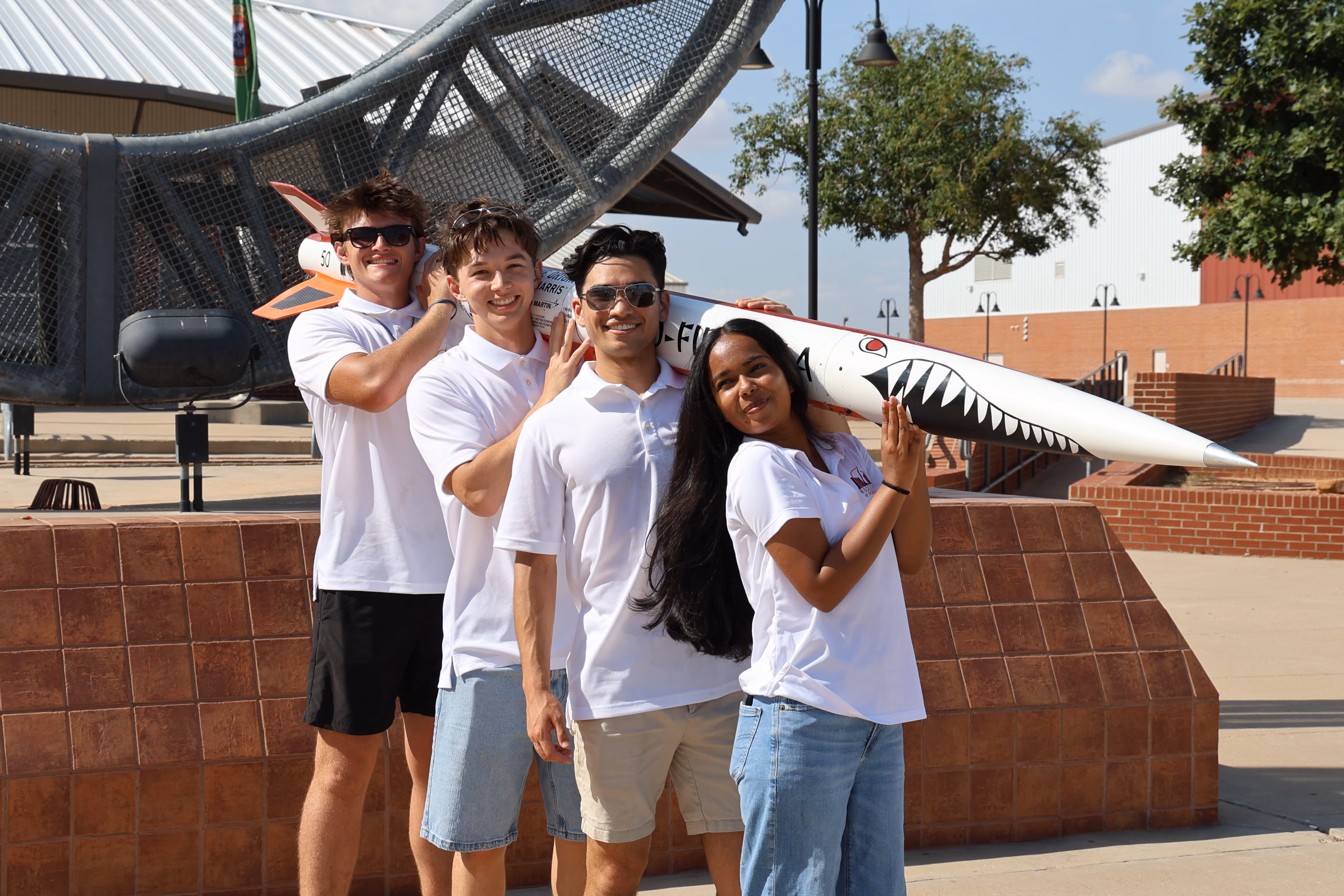 Josh, Mahima, Noah, and George with CARBOFIBEZILLA at 2026 IREC